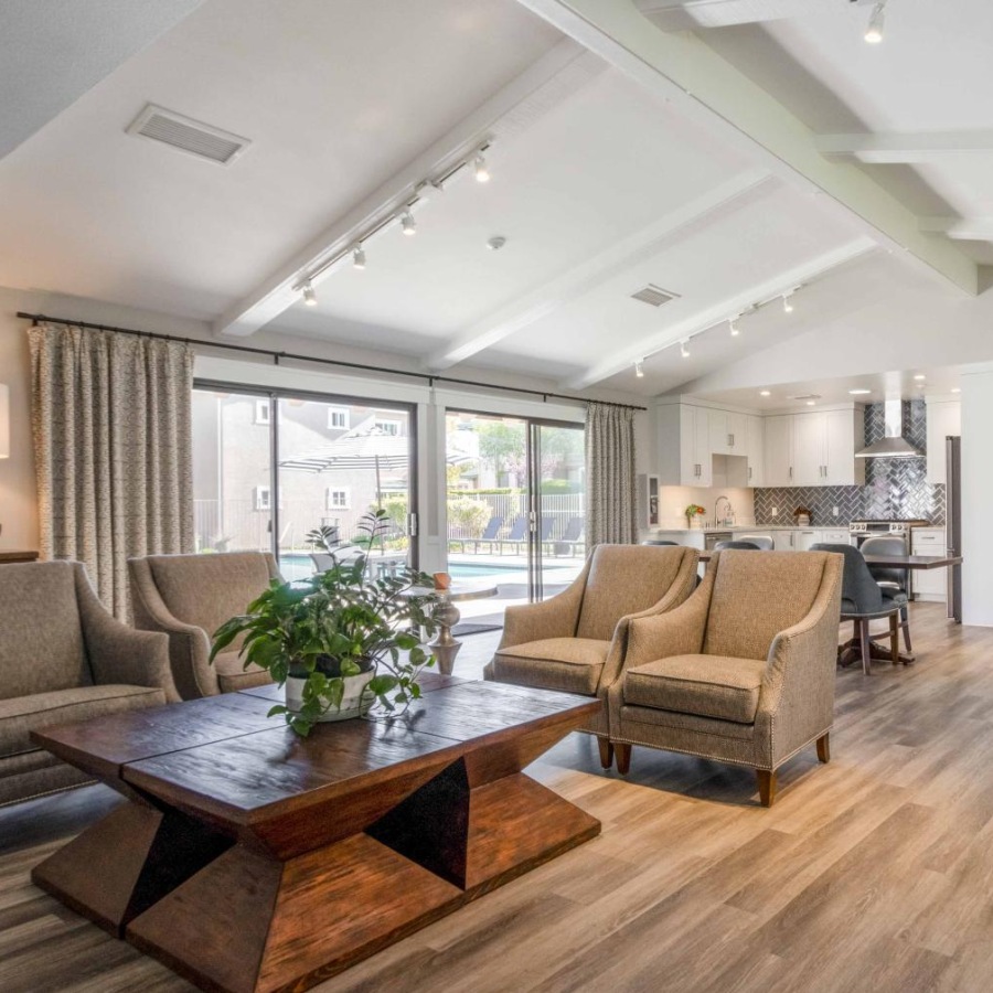 a large living room with a large glass door
