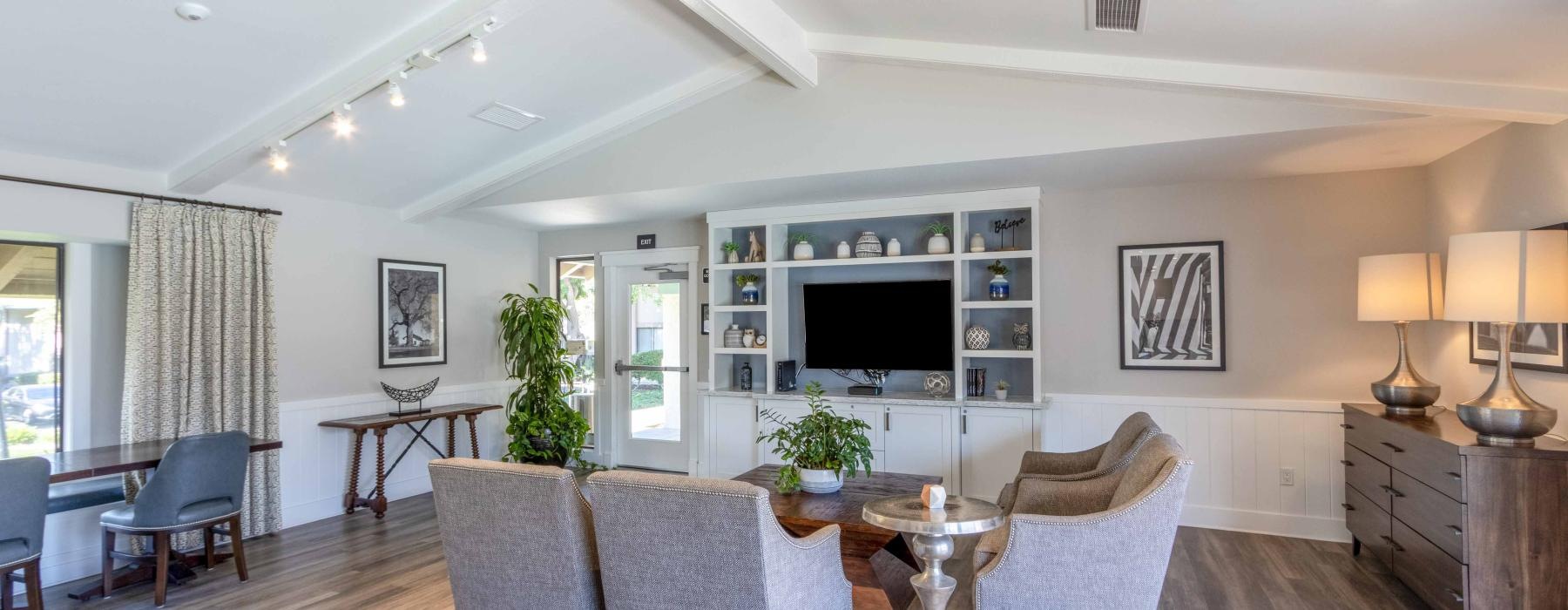 a living room with a wood floor